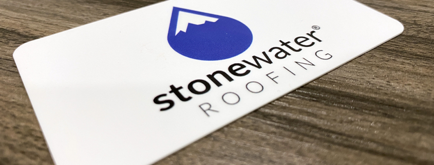 A business card for Stonewater Roofing.