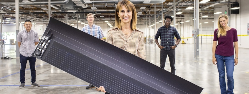 Senior Vice President of Solar R&D at GAF Energy holds a GAF solar shingle