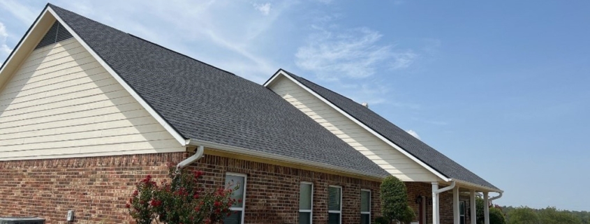 A well-maintained home with a healthy roof due to regular roof maintenance