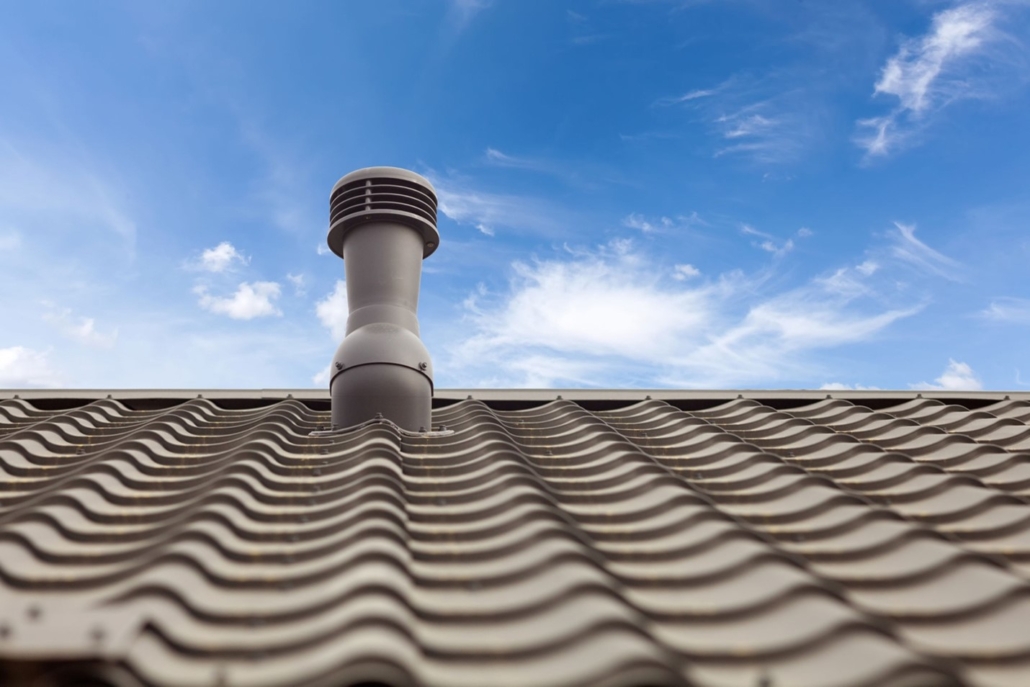 A slanted roof with metal roofing shingles. These types of shingles can be installed in various climates due to their durability.