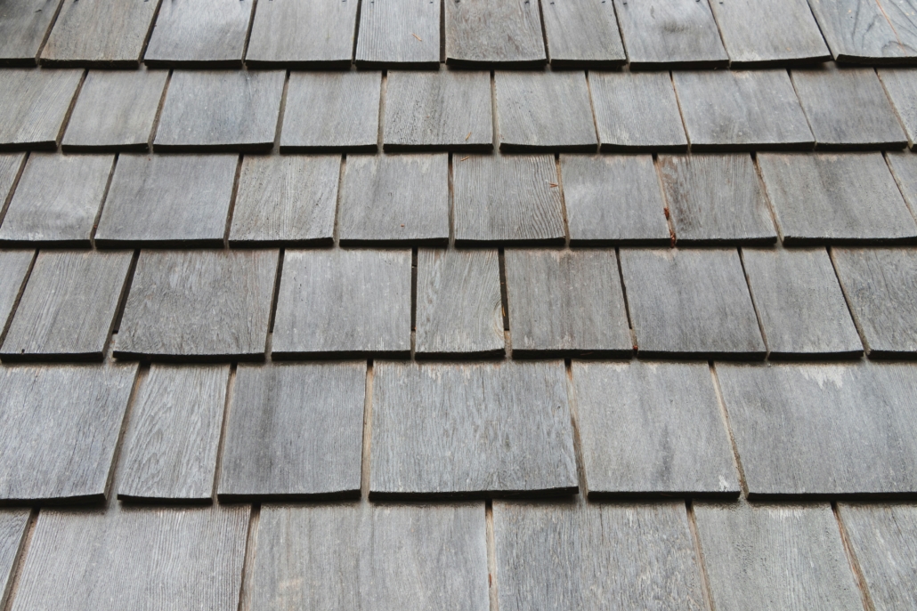 Wood shakes on a Texas roof. These are classic roofing materials that are extremely durable, but they require regular maintenance and are somewhat more expensive than some materials.