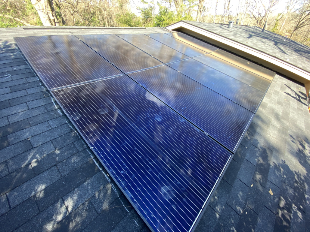 Solar panels installed on a home’s roof. Solar panels can increase a home’s value due to their potential to save the owners money on their power bill.
